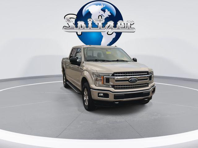 used 2018 Ford F-150 car, priced at $18,115