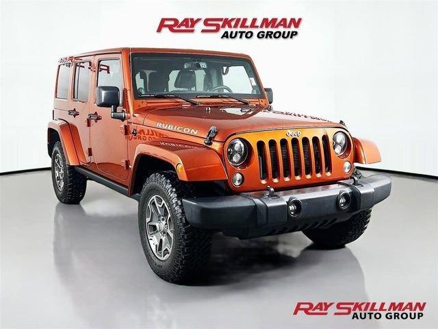 used 2014 Jeep Wrangler Unlimited car, priced at $25,975