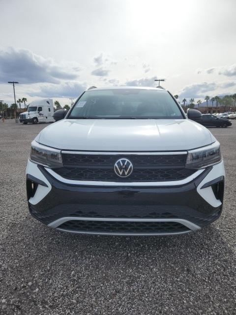 used 2023 Volkswagen Taos car, priced at $19,187