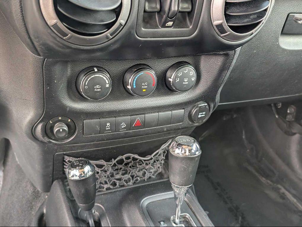used 2014 Jeep Wrangler Unlimited car, priced at $15,699