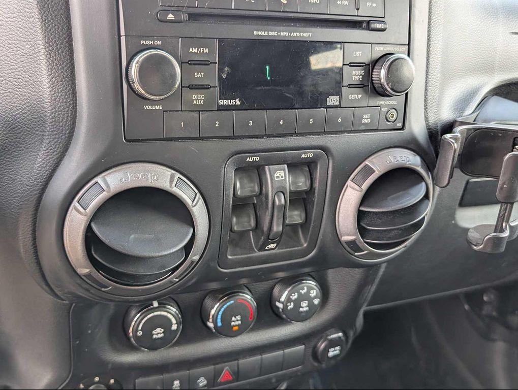 used 2014 Jeep Wrangler Unlimited car, priced at $15,699