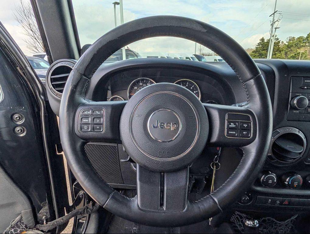 used 2014 Jeep Wrangler Unlimited car, priced at $15,699