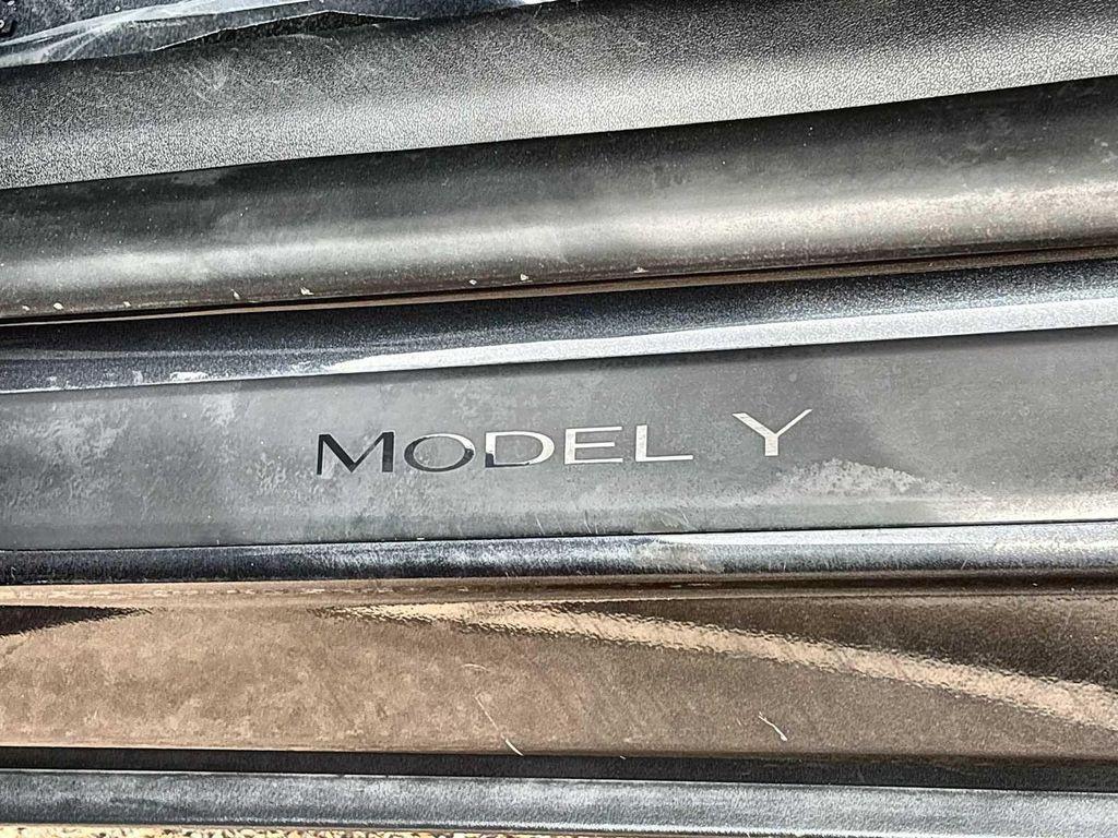 used 2024 Tesla Model Y car, priced at $31,300
