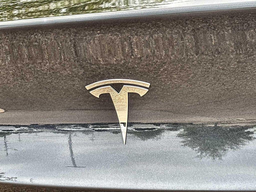used 2024 Tesla Model Y car, priced at $31,300