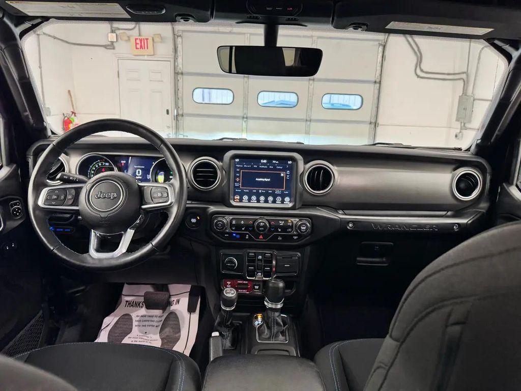 used 2023 Jeep Wrangler 4xe car, priced at $32,995