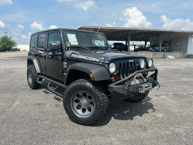 used 2012 Jeep Wrangler Unlimited car, priced at $12,977