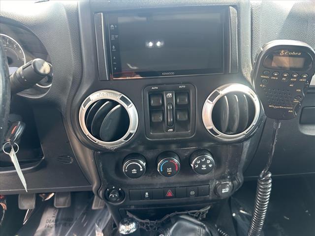 used 2012 Jeep Wrangler Unlimited car, priced at $12,977