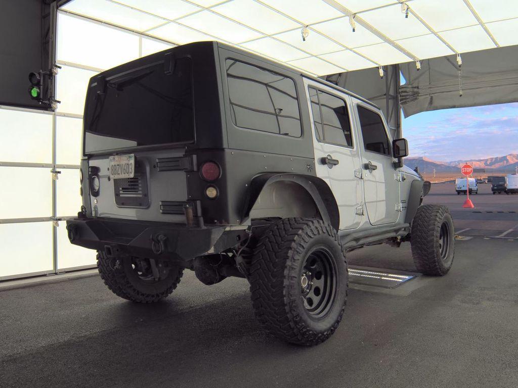 used 2018 Jeep Wrangler JK Unlimited car, priced at $22,572