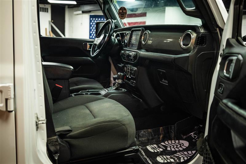 used 2023 Jeep Wrangler car, priced at $27,293