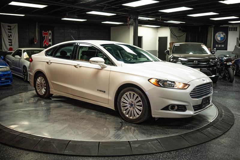 used 2015 Ford Fusion Hybrid car, priced at $5,095