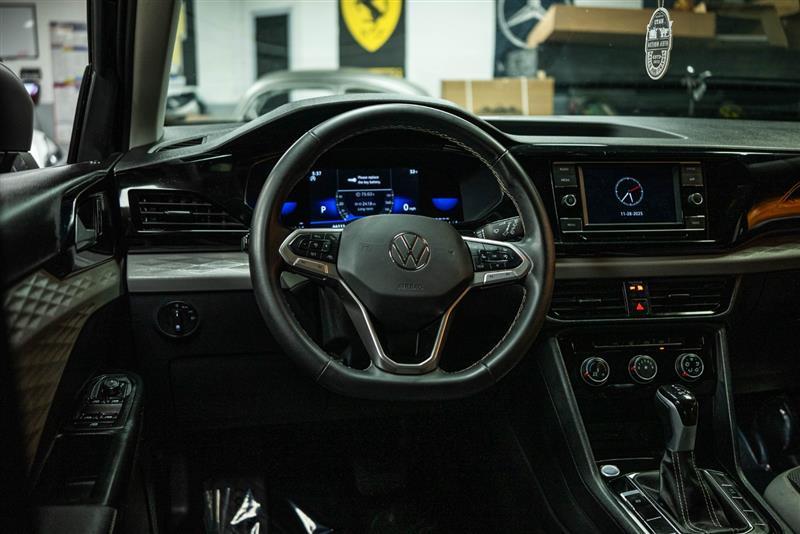 used 2024 Volkswagen Taos car, priced at $16,695