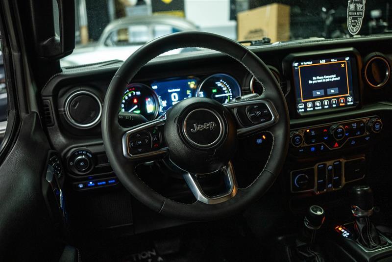 used 2023 Jeep Wrangler 4xe car, priced at $27,693