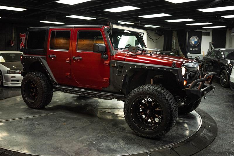 used 2013 Jeep Wrangler Unlimited car, priced at $15,395