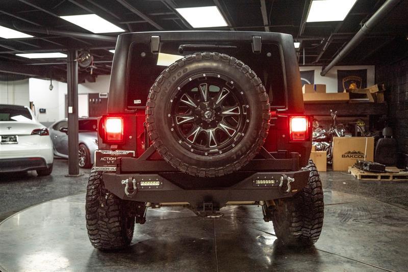 used 2013 Jeep Wrangler Unlimited car, priced at $15,395