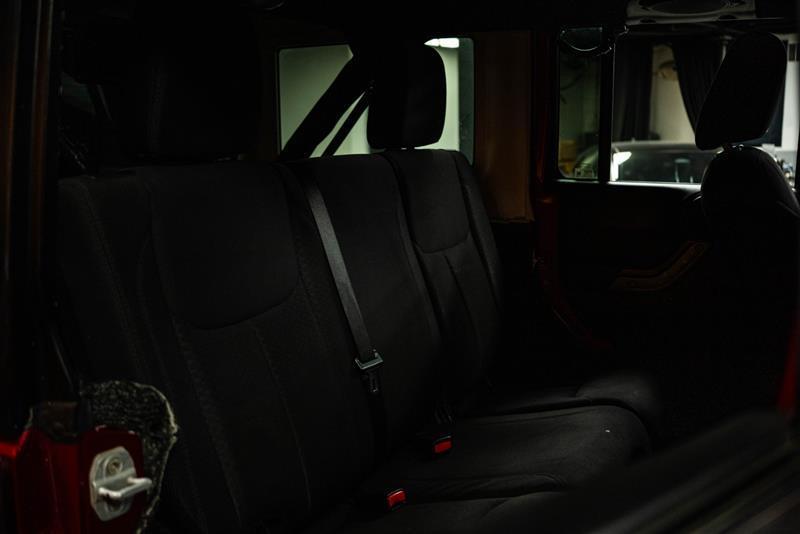 used 2013 Jeep Wrangler Unlimited car, priced at $15,395