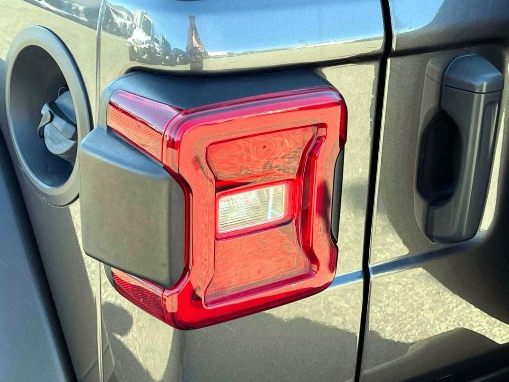 used 2021 Jeep Wrangler Unlimited car, priced at $25,159