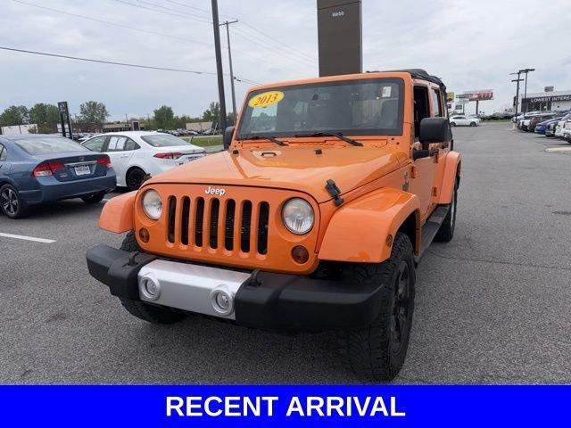 used 2013 Jeep Wrangler Unlimited car, priced at $13,693