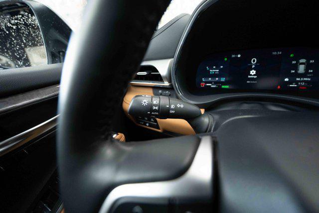 used 2024 Toyota Highlander Hybrid car, priced at $49,000