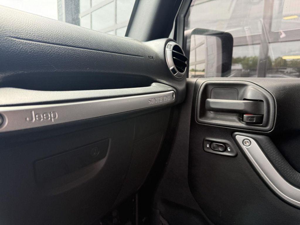 used 2016 Jeep Wrangler Unlimited car, priced at $24,701