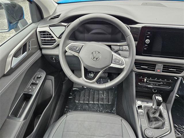 new 2025 Volkswagen Taos car, priced at $28,746