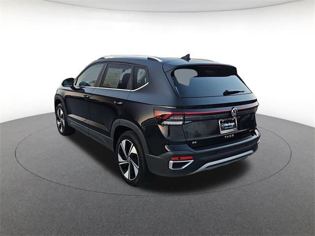 used 2025 Volkswagen Taos car, priced at $25,000
