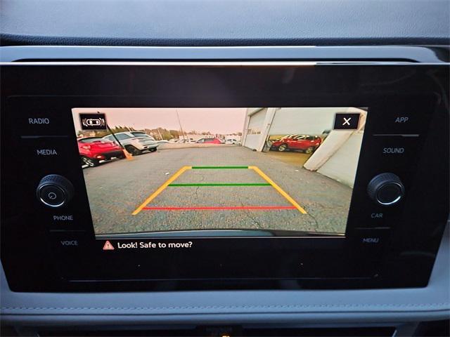 used 2025 Volkswagen Taos car, priced at $25,000