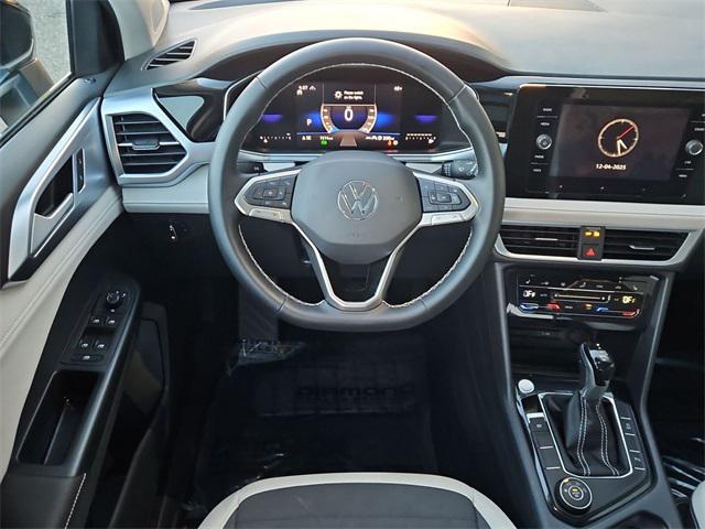 used 2025 Volkswagen Taos car, priced at $25,000