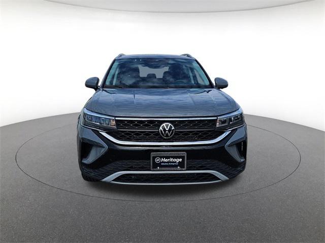 used 2023 Volkswagen Taos car, priced at $21,000
