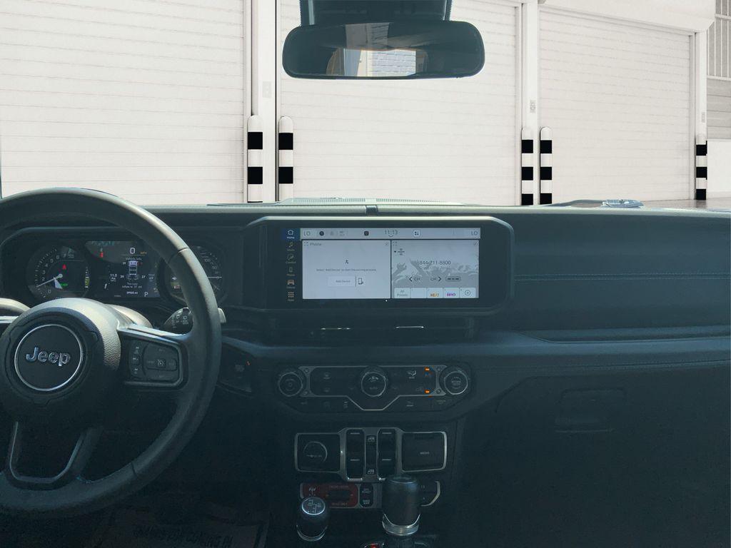 used 2024 Jeep Wrangler 4xe car, priced at $30,052