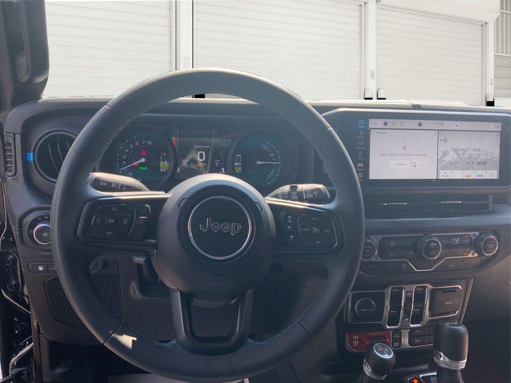 used 2024 Jeep Wrangler 4xe car, priced at $30,052