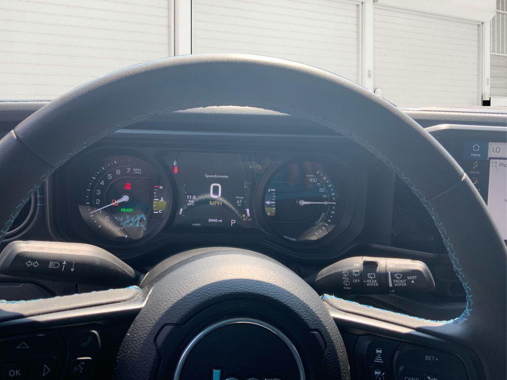 used 2024 Jeep Wrangler 4xe car, priced at $30,052