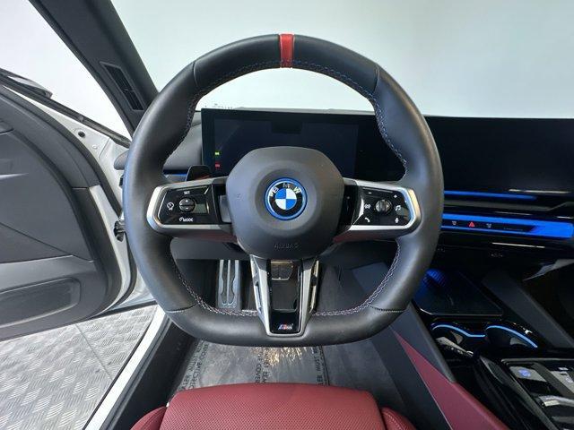 used 2024 BMW i5 car, priced at $56,928