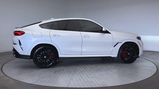 used 2024 BMW X6 car, priced at $62,971