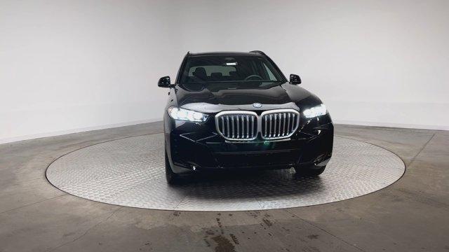 used 2025 BMW X5 PHEV car, priced at $71,447