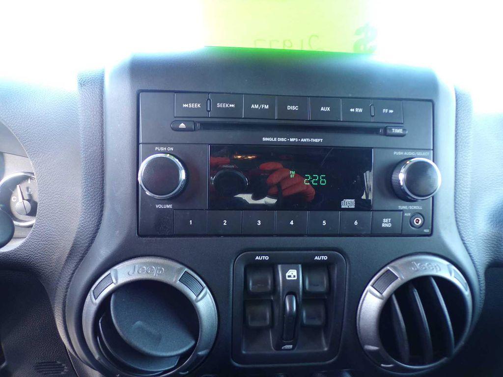 used 2018 Jeep Wrangler JK Unlimited car, priced at $21,977