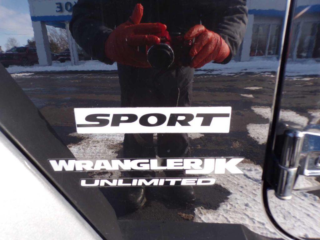 used 2018 Jeep Wrangler JK Unlimited car, priced at $21,977