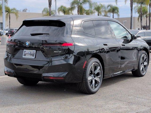 new 2026 BMW iX car, priced at $82,845