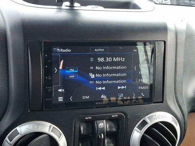 used 2014 Jeep Wrangler Unlimited car, priced at $17,637