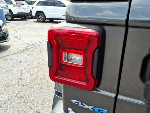 used 2023 Jeep Wrangler 4xe car, priced at $30,844