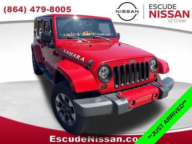 used 2011 Jeep Wrangler Unlimited car, priced at $14,321