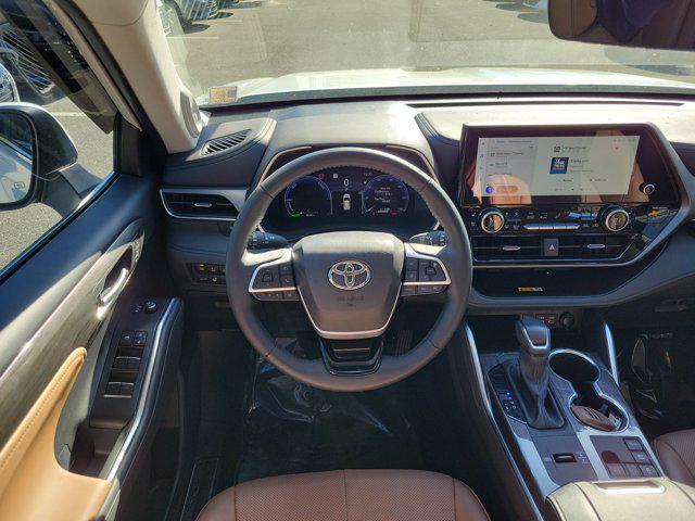 used 2025 Toyota Highlander Hybrid car, priced at $49,900