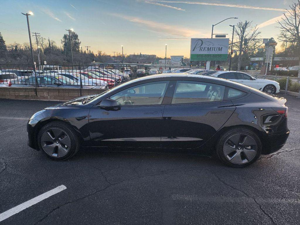 used 2023 Tesla Model 3 car, priced at $22,495