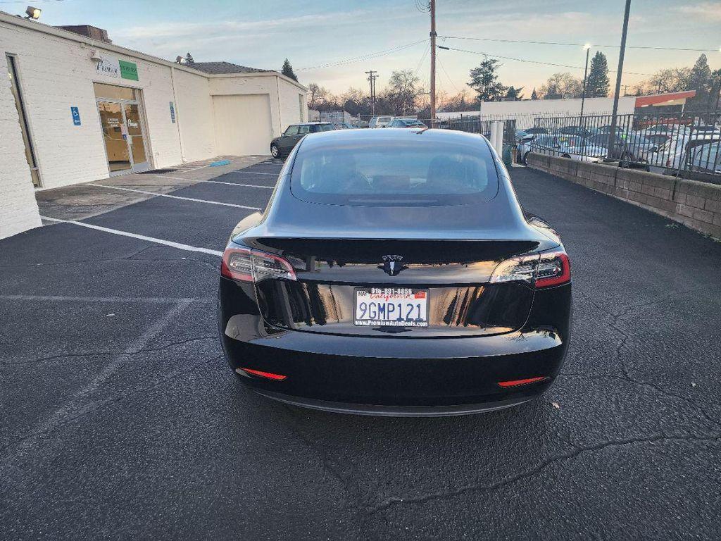 used 2023 Tesla Model 3 car, priced at $22,495