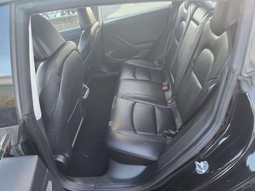 used 2023 Tesla Model 3 car, priced at $22,495