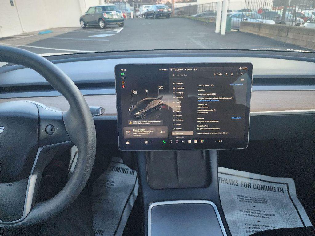 used 2023 Tesla Model 3 car, priced at $22,495