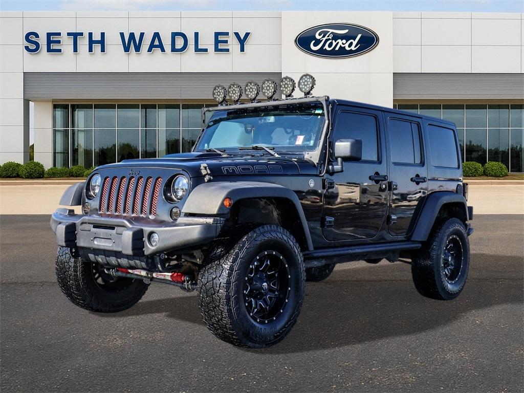 used 2013 Jeep Wrangler Unlimited car, priced at $19,021