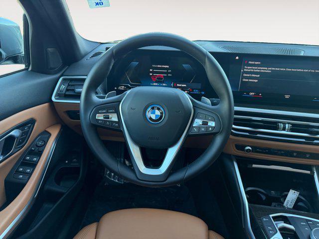 used 2023 BMW 330e car, priced at $30,800