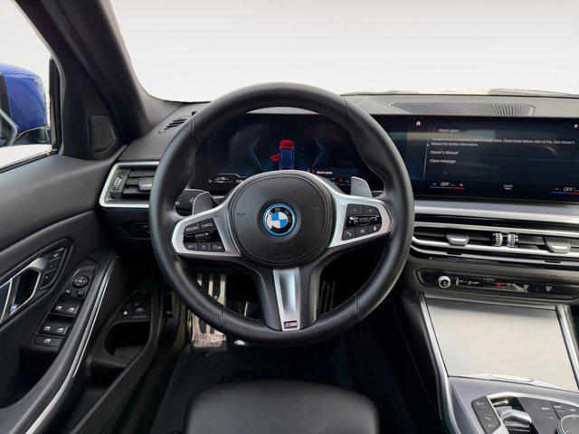 used 2023 BMW 330e car, priced at $29,995