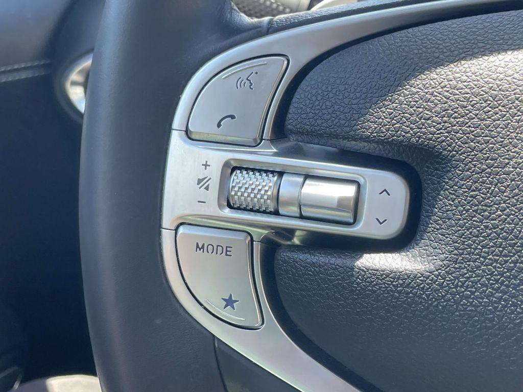 used 2024 Genesis GV70 car, priced at $38,342