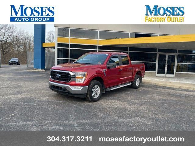used 2021 Ford F-150 car, priced at $33,335